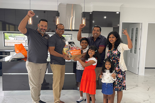 happy family with new home from Integrity new Homes Cairns