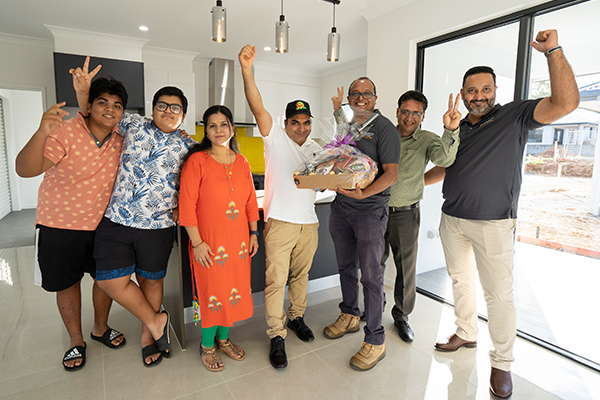 happy family with new home from Integrity new Homes Cairns