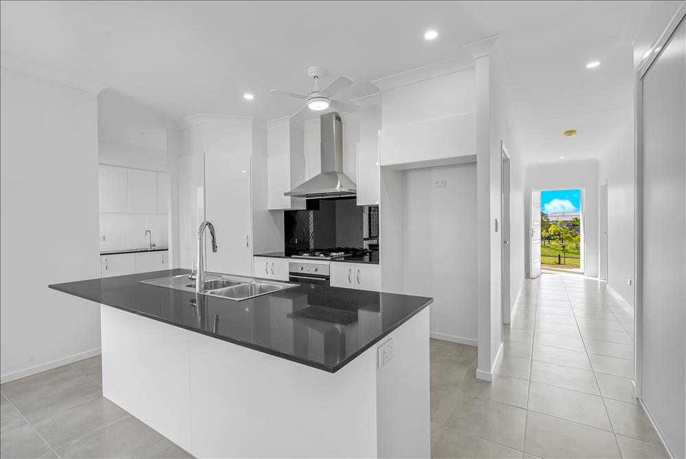 Home Design Internal. Kitchen. Island Bench. Cooktop. New Home in Trinity Beach.
