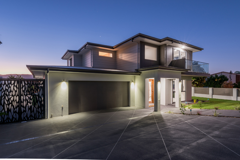 Home Design External. Dusk. Front. Two level home. Contemporary. Plenty of glass.