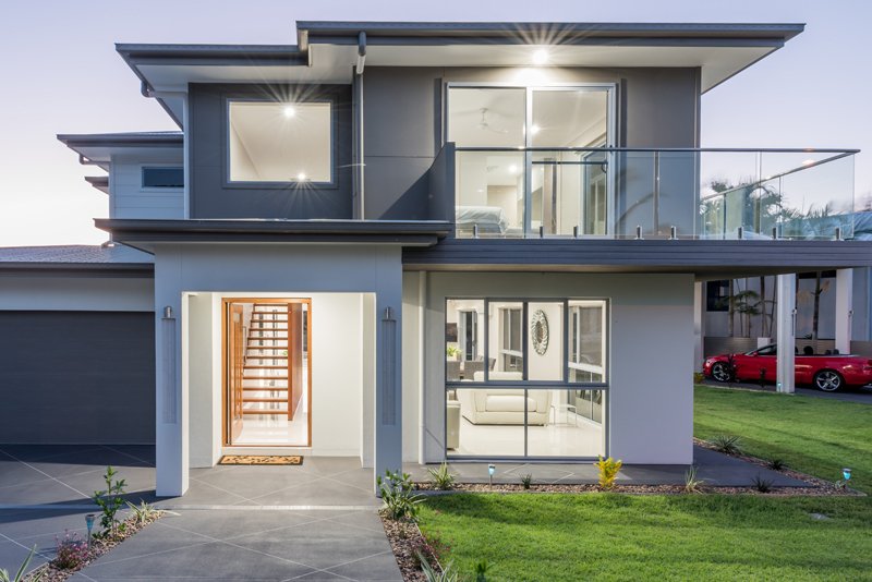 Home Design External. Dusk. Front. Two level home. Contemporary. Plenty of glass.