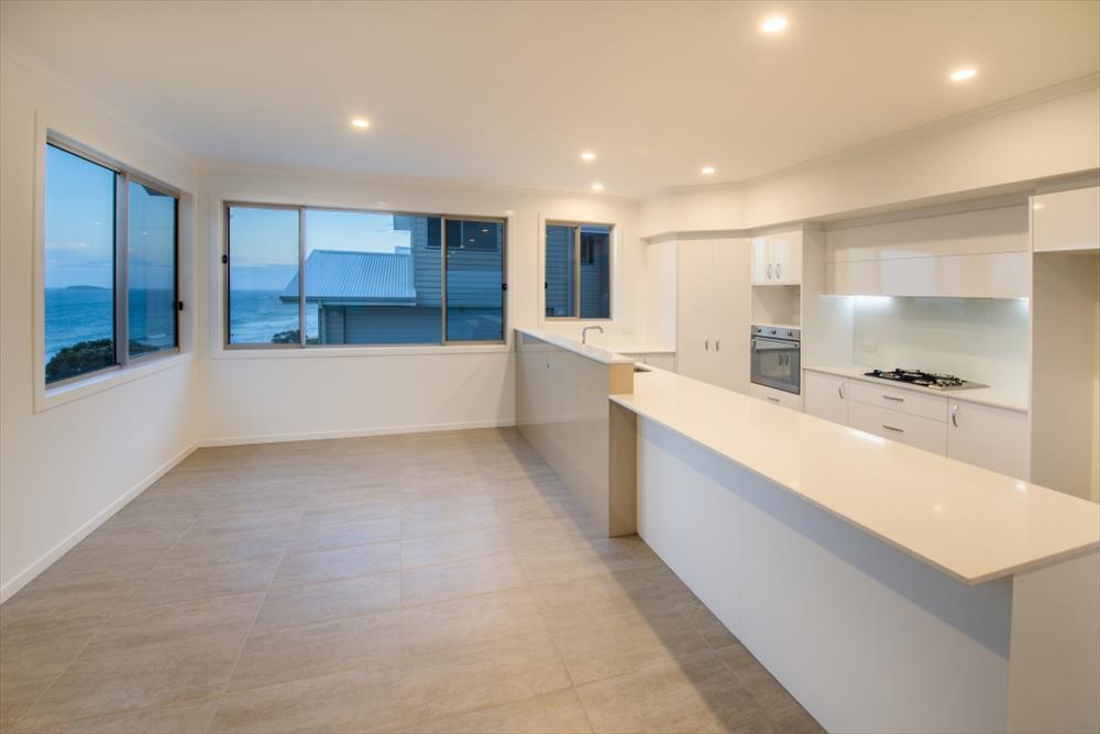 Home Design Internal. Unit1 Kitchen. Island Bench. ocean views.