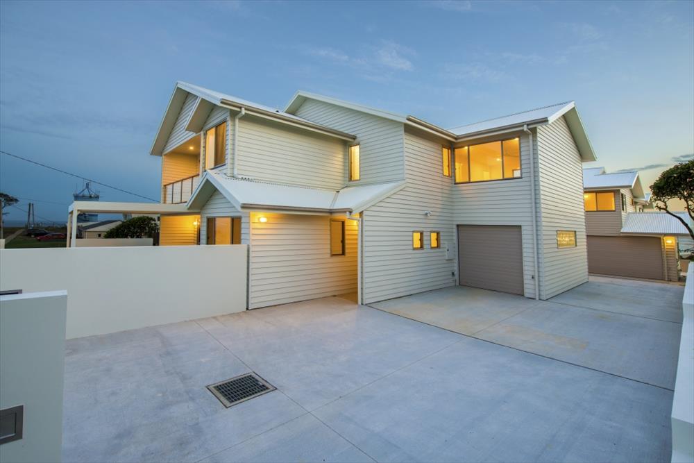 Home Design External. Front View. Unit 1 with garage of Unit 2 in distance