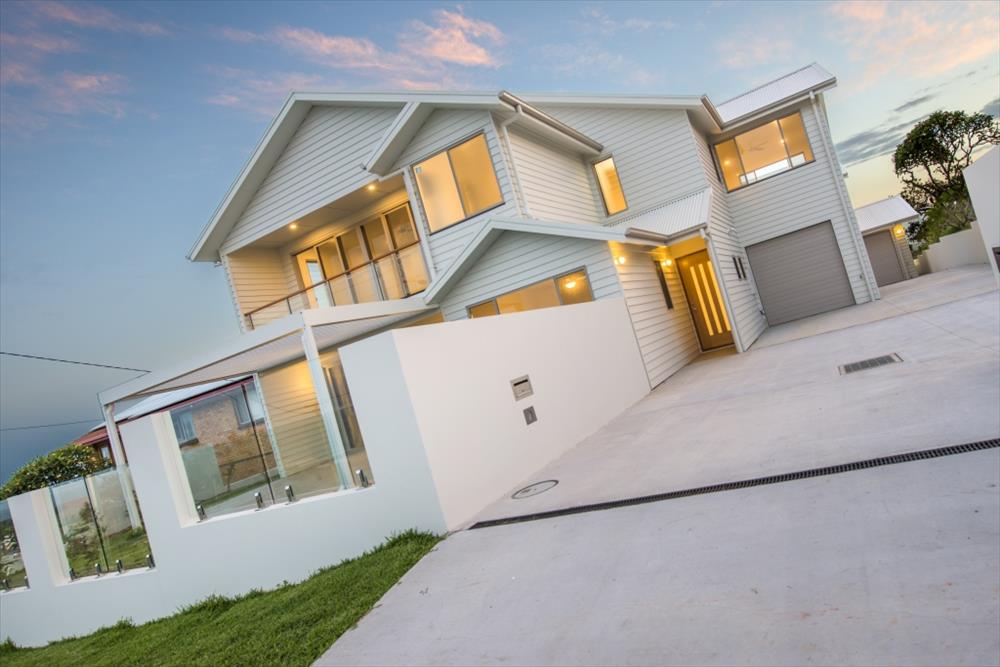 Home Design External. Front View. Unit 1 with garage of Unit 2 in distance