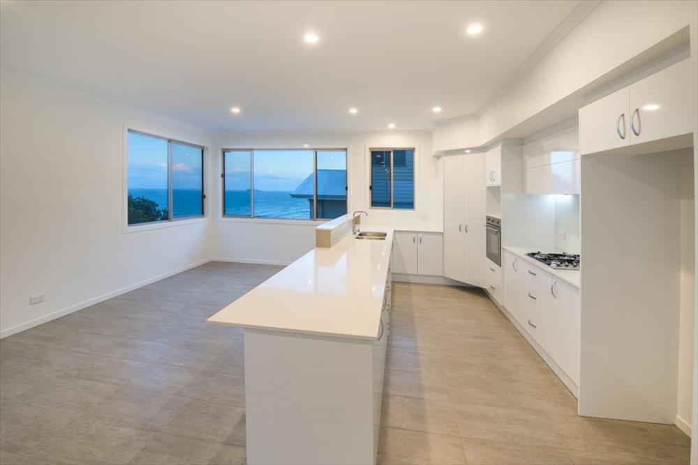 Home Design Internal. Unit1 Kitchen. Island Bench. ocean views.