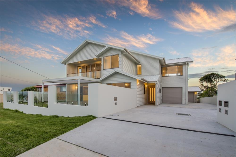 Home Design External. Front View. Unit 1 with garage of Unit 2 in distance