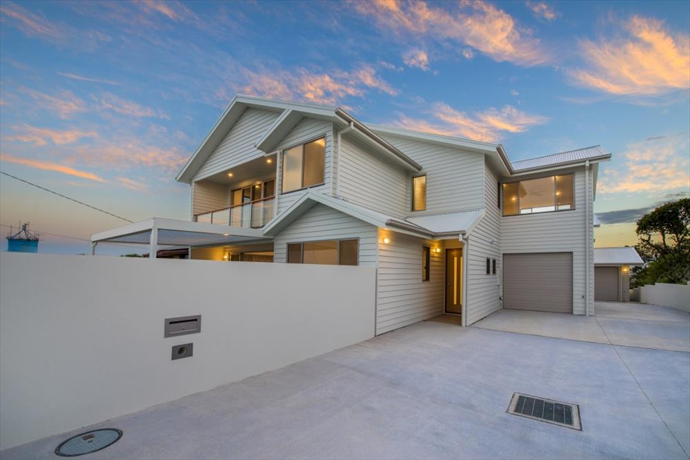 Home Design External. Front View. Unit 1 with garage of Unit 2 in distance